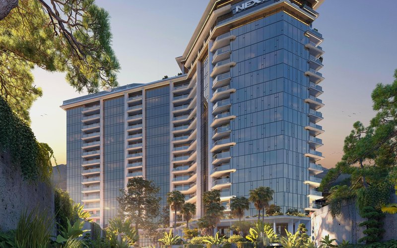 ЖК Magnolia Residence в Гонио от Next Group — рендер башни с прудом и зеленью